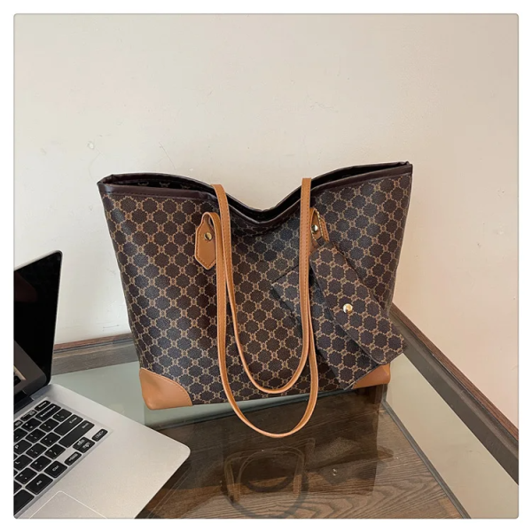 The Adorn Curve Bag - Premium Monogram Canvas Tote