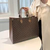 The Adorn Curve Bag - Premium Monogram Canvas Tote