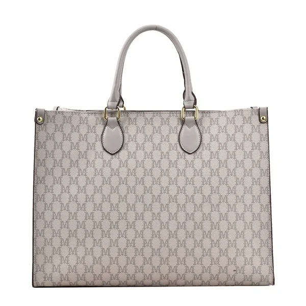 The Adorn Curve Bag - Premium Monogram Canvas Tote