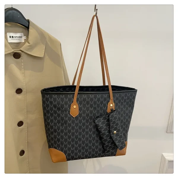 The Adorn Curve Bag - Premium Monogram Canvas Tote