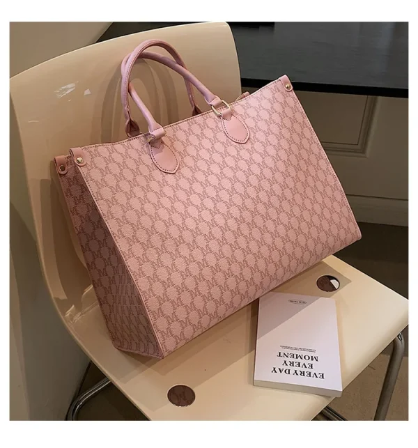 The Adorn Curve Bag - Premium Monogram Canvas Tote
