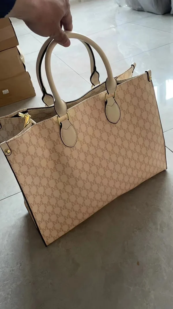 The Adorn Curve Bag - Premium Monogram Canvas Tote