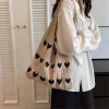 The Adorn Knit Love Bag