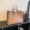 The Adorn Curve Bag - Premium Monogram Canvas Tote