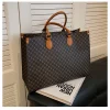 The Adorn Curve Bag - Premium Monogram Canvas Tote