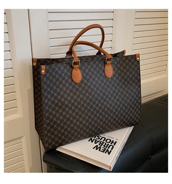 The Adorn Curve Bag - Premium Monogram Canvas Tote